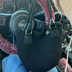 The SAK black crochet purse